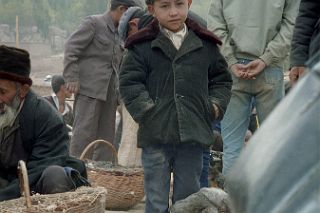 46 Kashgar Sunday Market 1993 Young Boy With Chickens.jpg